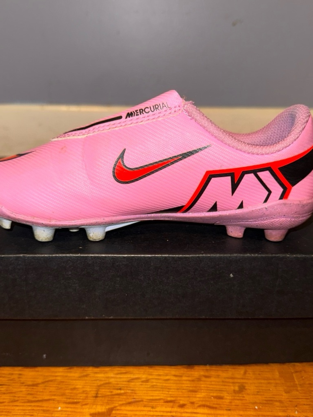 Nike Kids Pink soccer  cleats with Red Swoosh